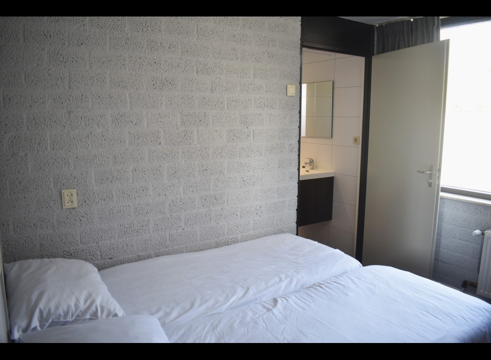 Slaapkamer beneden.JPG